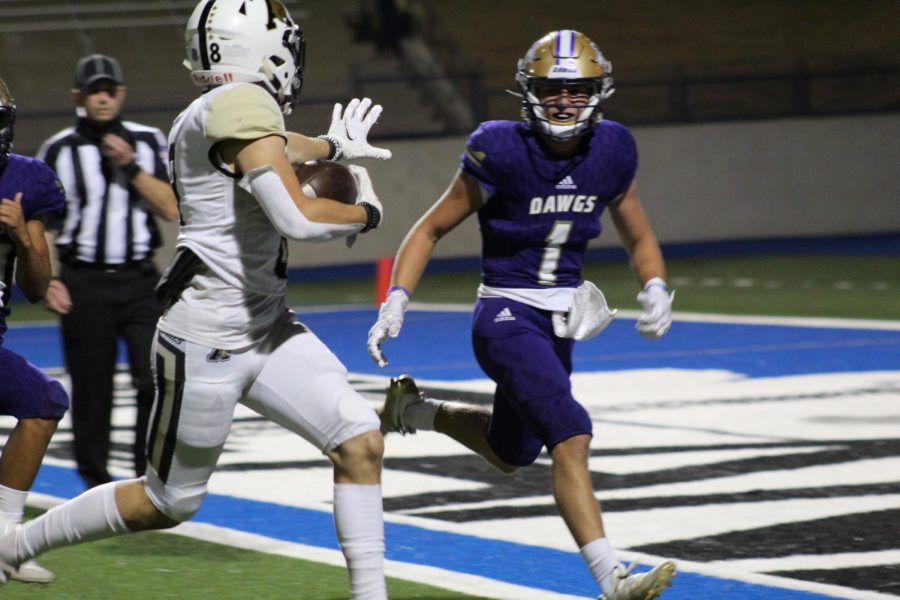 Jameson Garcis (8) runs the ball for a touchdown during the Midland High game. 