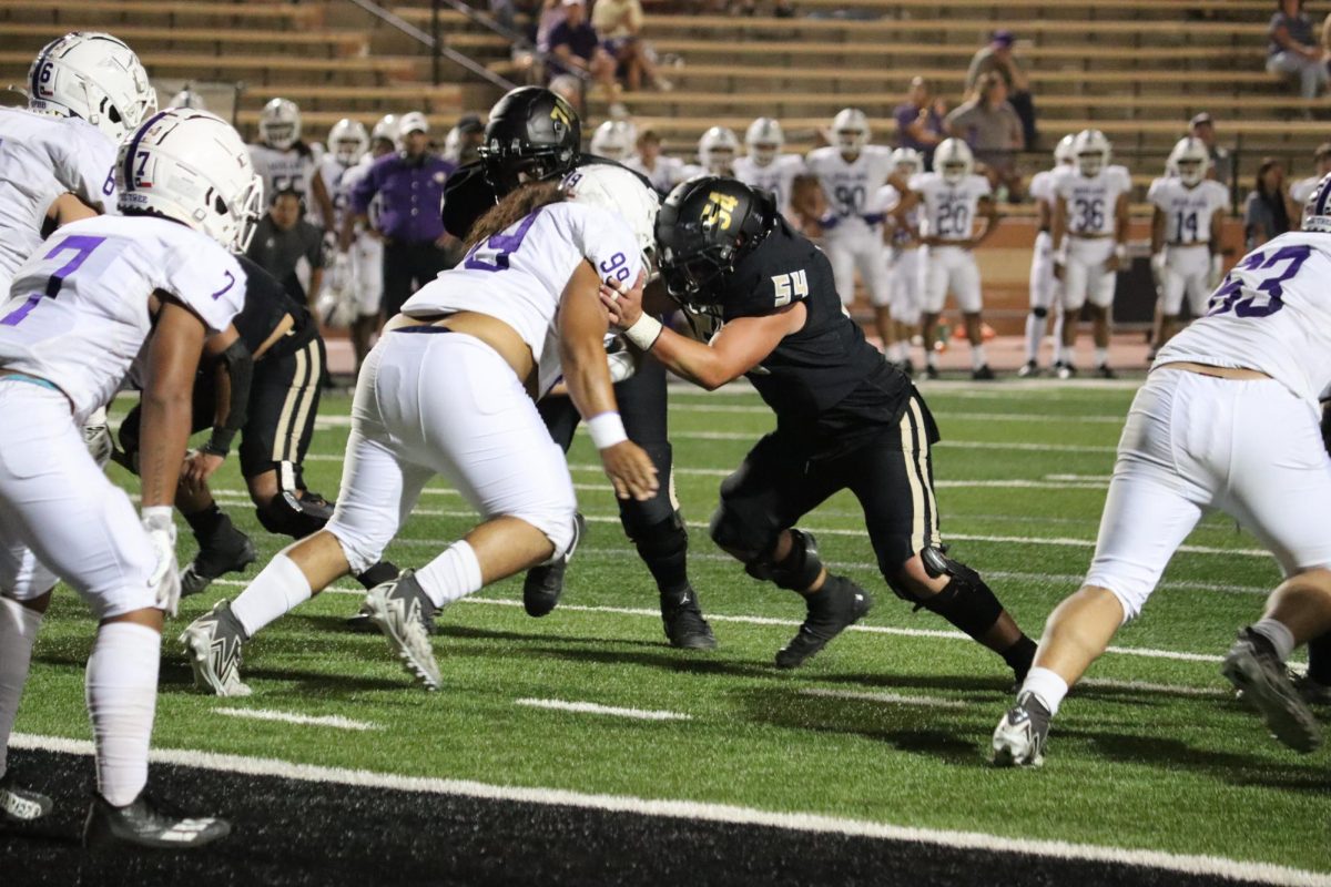 Sandies work to fend off the Bulldogs
