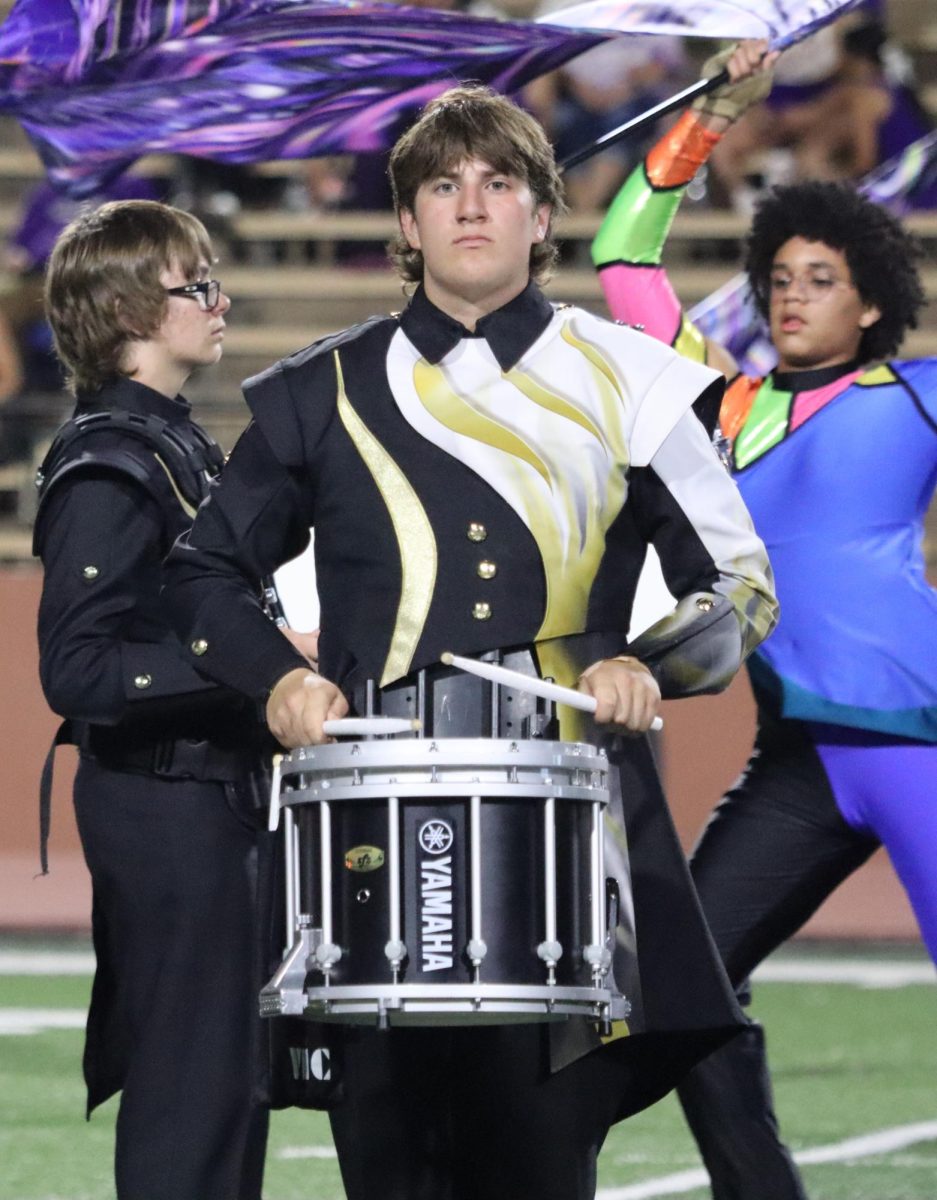 Nicholas Welshimer performs during the halftime show